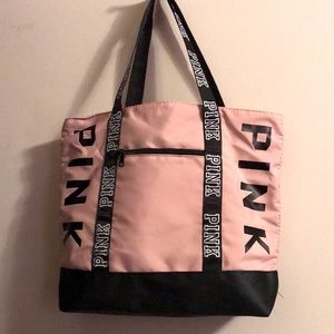 Ladies Pink Tote Bag with zipper front pocket. Inside Lining. NWOT